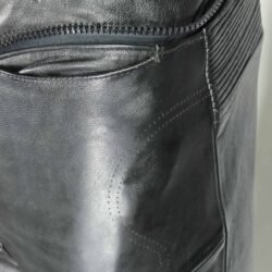 A pair of black Hein Gericke Streetline leather motorcycle pants, size 48 (85 cm waist), in good condition. Features a classic café-racer style with foam knee protectors. Hip protectors have been removed, leaving visible stitch holes but not affecting function.