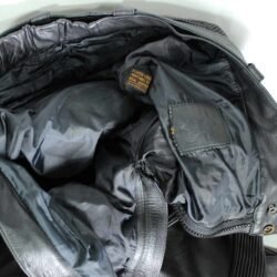 A pair of black Louis leather motorcycle trousers, size XL/27 (107 cm stretch waist), in good condition. Features a café-racer and street style with foam knee and hip protection, a full-length jacket connection zipper, a matching leather belt, and high-quality cowhide construction.