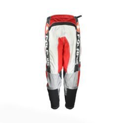 A pair of Polaris Cross motorcycle pants in black, red, and grey, size XL (96 cm stretch waist), in good condition. Features a motocross-style textile construction with integrated knee protectors.