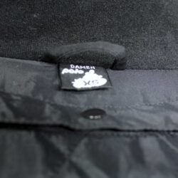 A black and blue Polo Competition R women's leather motorcycle jacket, size 36, in very good condition. Features a snug racing fit, shoulder, elbow, and back protectors, reflective stripes, and a connection zipper for track days or street riding.