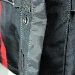 A black and red Probiker waterproof and breathable touring and adventure jacket, size M, in good condition. Features a climate membrane and shoulder protectors. Shows wear and includes professional repair patches in some areas (see product photos)