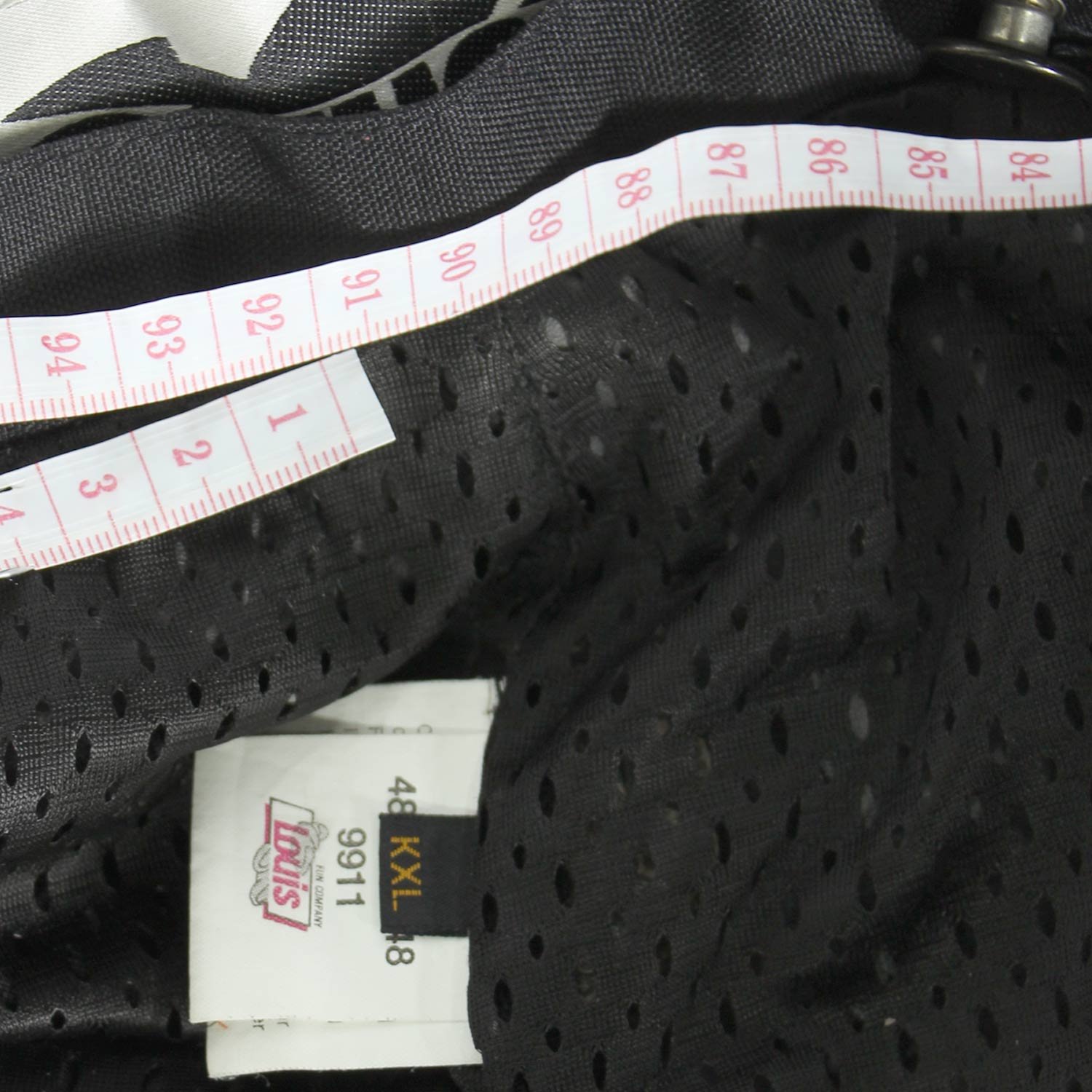 A pair of black Vanucci waterproof touring motorcycle trousers, size XL, in very good condition. Made of durable textile with a SympaTex membrane and features both short and full-length jacket connection zippers. Pockets for knee and hip protectors are included (protectors not provided)