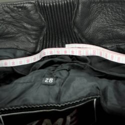 A pair of black ZME Racing leather motorcycle pants, size XXL/28 (91 cm waist), in very good condition. Features a racing and café-racer style with foam protectors at the knees and hips.