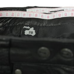 A pair of black Polo classic women's leather motorcycle pants, size 38 (77 cm waist), in very good condition. Features a cruiser/chopper style with a classic leather look and includes minor wear marks.