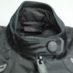 A black and white A-pro women's 4-season textile motorcycle jacket, size L, in very good condition. Features removable sleeves for summer vest conversion, a HotLife thermal vest, CE-approved shoulder and elbow protectors, front air intakes, and stretch panels for touring and street riding.