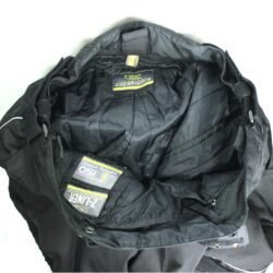 A pair of black Advanced Experience all-season adventure touring textile motorcycle pants, size L, in very good condition. Features a waterproof Z-Liner membrane, removable thermal liner, side air vents for ventilation, knee protectors, and reflective stripes for visibility