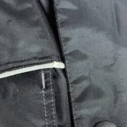 A black BLH all-season textile motorcycle jacket, size XL, in good condition. Features a waterproof climate membrane, removable thermal liner, CE-rated protection for shoulders, elbows, and back, and reflective stripes for visibility during touring and street riding.