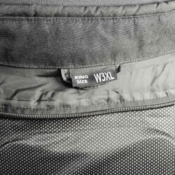 A black Bering Tank King Size textile motorcycle jacket for plus-sized riders, size W3XL/IT 58 (150 cm chest), in like-new condition. Features a waterproof climate membrane, CE-certified shoulder, elbow, and back protectors, height-adjustable elbow armor, and reflective detailing for touring.