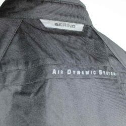 A black Bering Tank King Size textile motorcycle jacket for plus-sized riders, size W3XL/IT 58 (150 cm chest), in like-new condition. Features a waterproof climate membrane, CE-certified shoulder, elbow, and back protectors, height-adjustable elbow armor, and reflective detailing for touring.