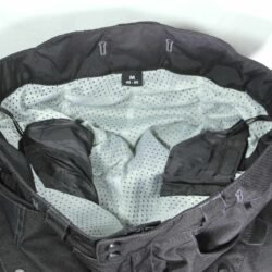 A pair of black FLM Adventure Technology touring and adventure textile motorcycle pants, men's size M (48-50), in very good condition. Features included knee protectors, side cargo pockets, a stretch panel, and thigh mesh vents for ventilation