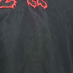 A black and red Furygan Titan sport racing textile jacket, size XL (105-112 cm chest), in good condition. Features a waterproof climate membrane, removable CE-approved D3O protectors at shoulders, elbows, and back, aluminum impact reinforcements, and a removable quilted thermal liner.