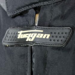A black and red Furygan Titan sport racing textile jacket, size XL (105-112 cm chest), in good condition. Features a waterproof climate membrane, removable CE-approved D3O protectors at shoulders, elbows, and back, aluminum impact reinforcements, and a removable quilted thermal liner.