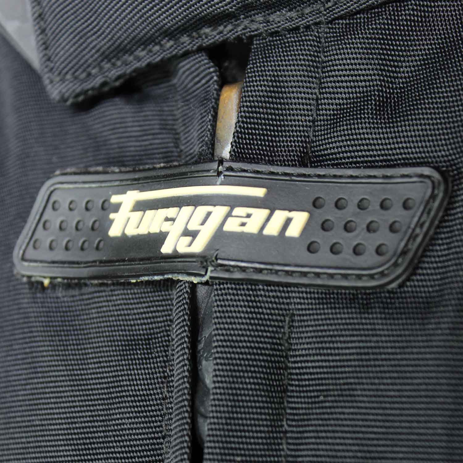 A black and red Furygan Titan sport racing textile jacket, size XL (105-112 cm chest), in good condition. Features a waterproof climate membrane, removable CE-approved D3O protectors at shoulders, elbows, and back, aluminum impact reinforcements, and a removable quilted thermal liner.