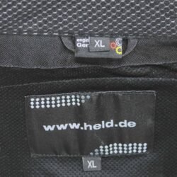 A black, red, and beige Held Tropic 3.0 summer mesh motorcycle jacket, size XL, in like-new condition. Features a HEROS-TEC 600D shell with extensive mesh panels, Level 2 CE protectors at shoulders, elbows, and back, reflective details, and multiple adjustment points for street and touring riding.