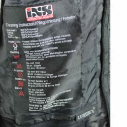 A black IXS touring and adventure textile motorcycle jacket, size M, in very good condition. Features a waterproof Solto-TEX Z-Liner membrane, multiple ventilation openings, 9 pockets including waterproof options, adjustable fit, and CE-rated shoulder, elbow, and back protectors