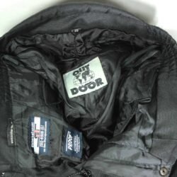 A pair of black OutDoor women's touring and street textile motorcycle pants, size S, in good condition. Features robust fabric construction, precise waist adjustments for fit, and pockets for knee and hip protectors (protectors not included)