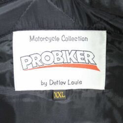 A black Probiker classic-style textile motorcycle jacket, size XXL, in like-new condition. Features integrated shoulder, elbow, and back protectors for touring and street riding in fair weather.